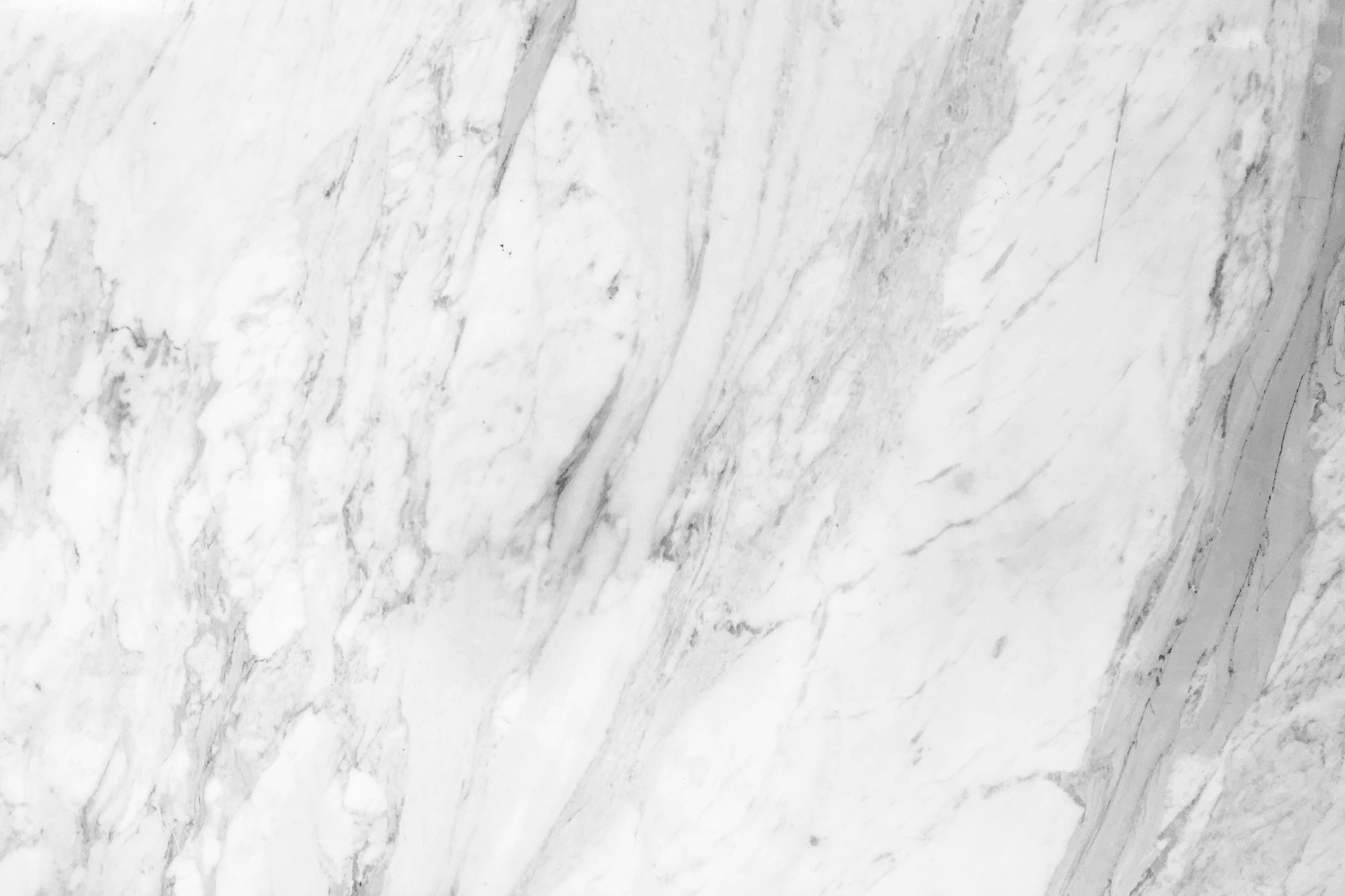 Close-up of white marble with diagonal grey veining